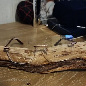 Dolce & Gabbana Rose Gold Rimless Glasses